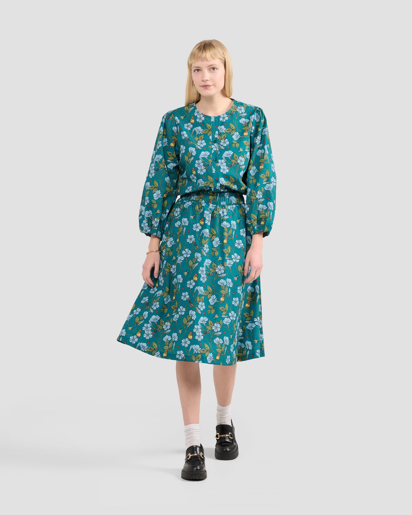 Women's Puff Sleeve Blouse With A Hand-Drawn Flora in Flight Print